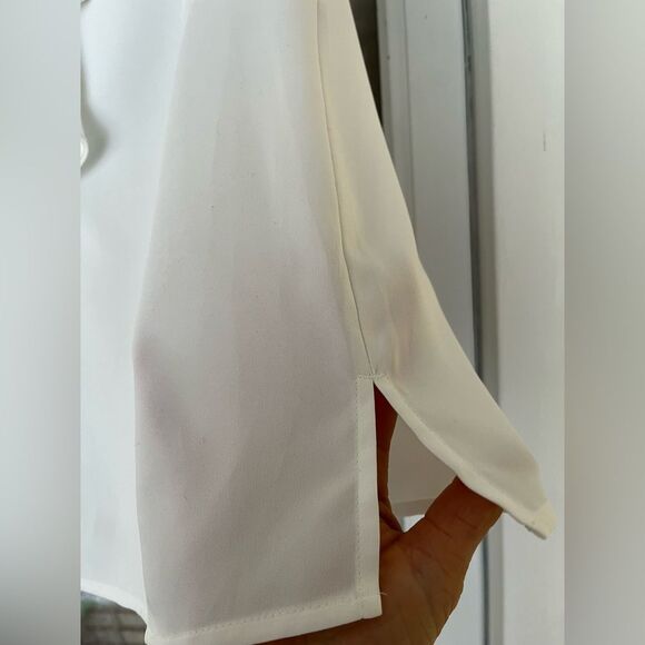 Chico’s white sleeveless v-neck blouse, jabot in front, slits at sides, size 0. - Picture 4 of 7